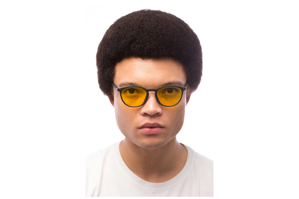 Man Wearing Echo Light Sensitivity Glasses Readers