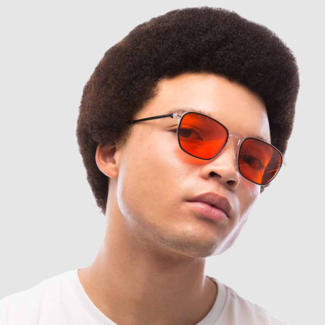 Man wearing glasses for reducing digital eye strain