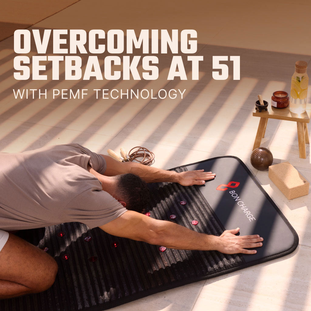 Man Outside Stretching with Arms Wide On PEMF Mat
