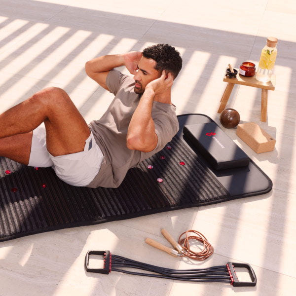 Man Doing Workout On Infrared PEMF Mat Max